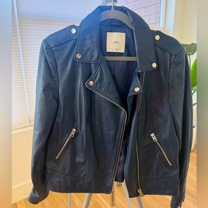 Blue leather jacket - bought in Spain.